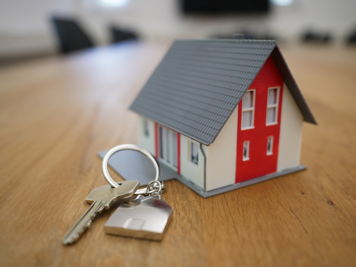 House keys held outside a residential property